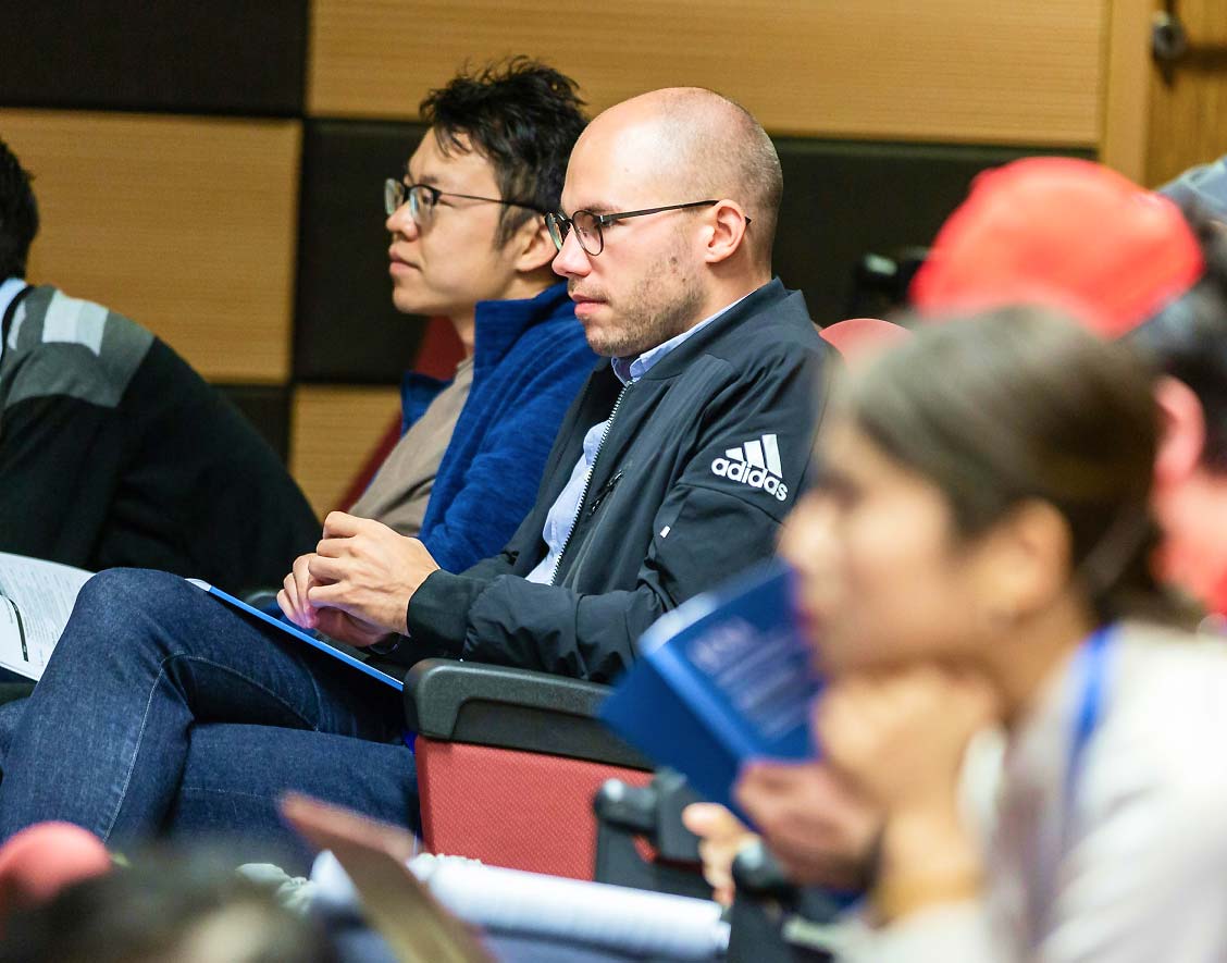 People sitting and Listening People sitting and Listening